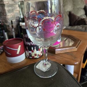 Elegant Wine Glass with Red and Silver Accents